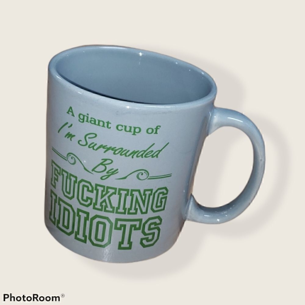 I'M SURROUNDED BY FUCKING IDIOTS COFFEE MUG